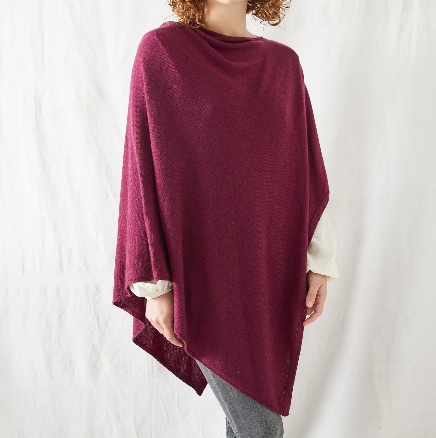 Aura Que Risi merino ponchos in blue or plum