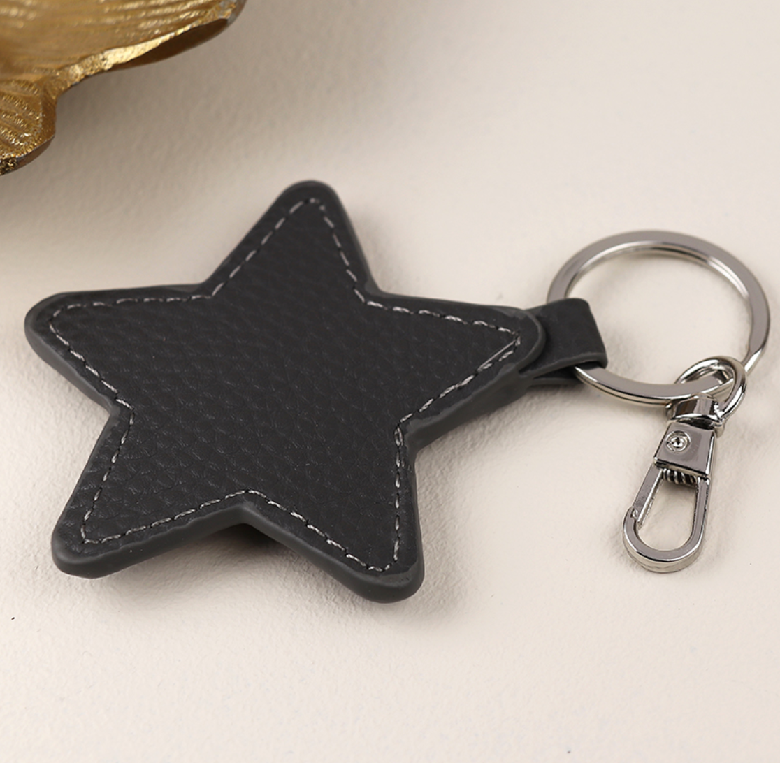 Pom faux leather star keyring - various colours
