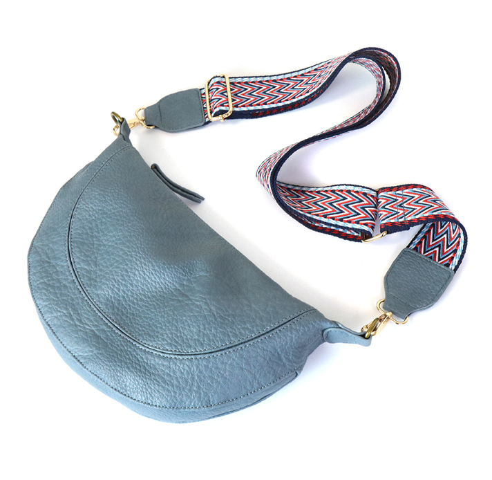 POM Vegan leather half moon handbag in denim blue with zig zag strap