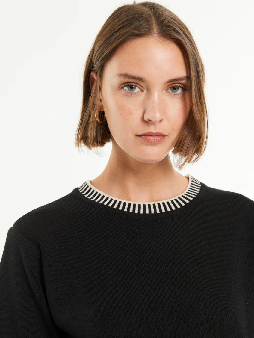 Paz Torras black sweater with contrast stitching