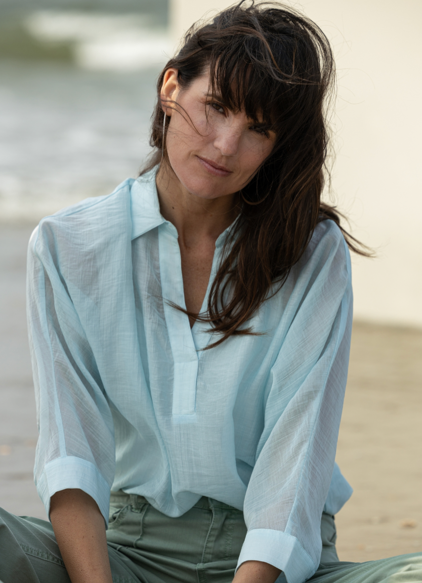 White blouse with v neck and lace detail three quarter sleeves