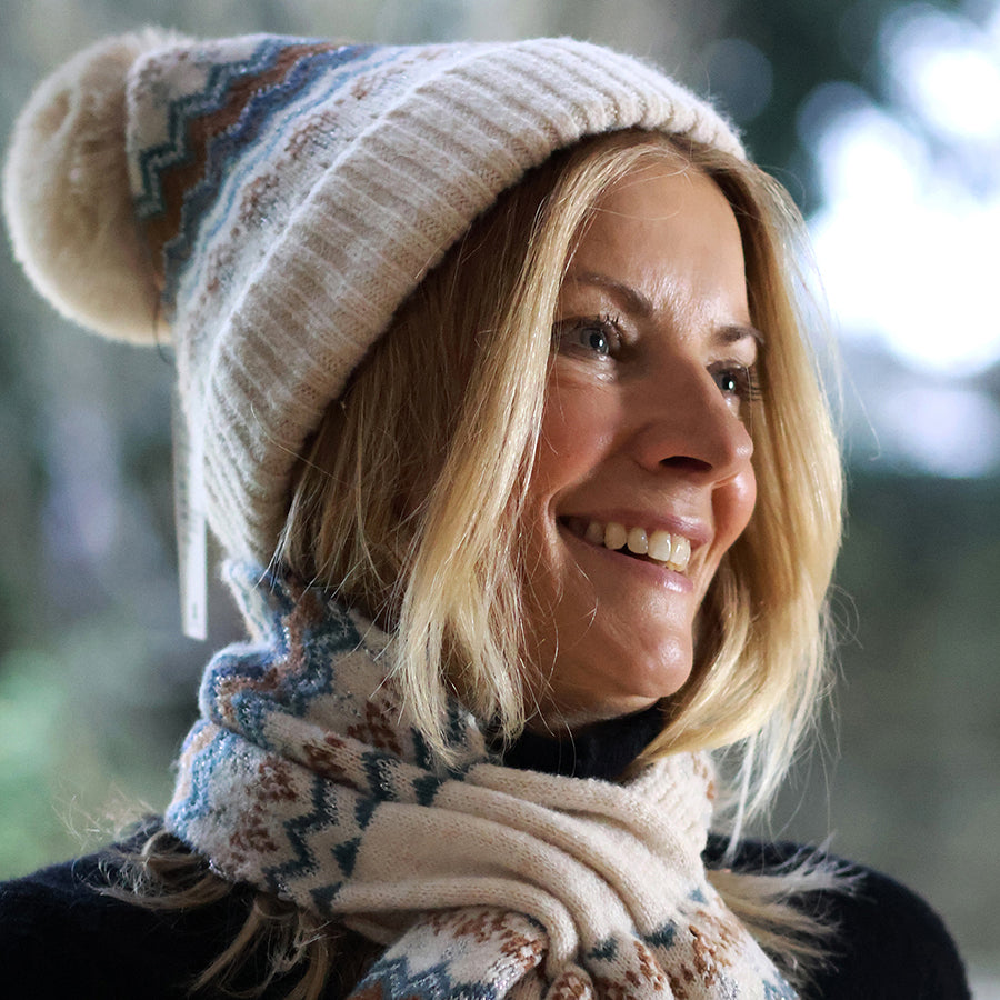 POM Sophia rust and teal zig zag striped bobble hat - [shop_name Strathaven] [womens clothing]