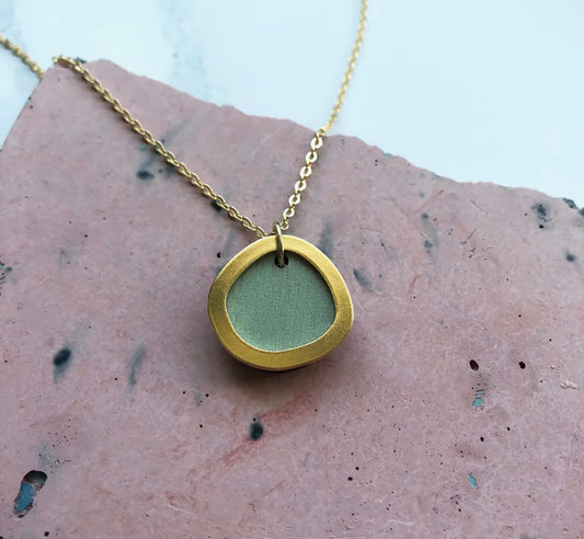 Mica Peet Coloured gold circle pendant in mint