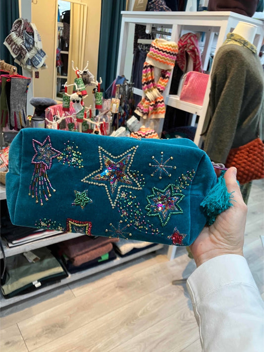 POM Teal embroidered shooting stars make up bag