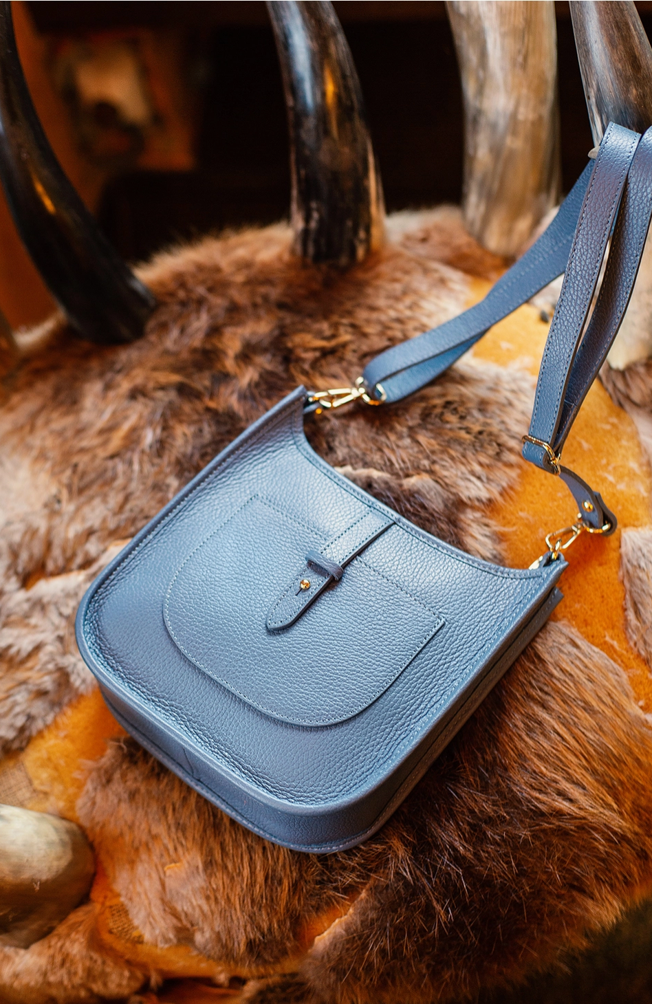 Leather zip top handbag in petrol blue