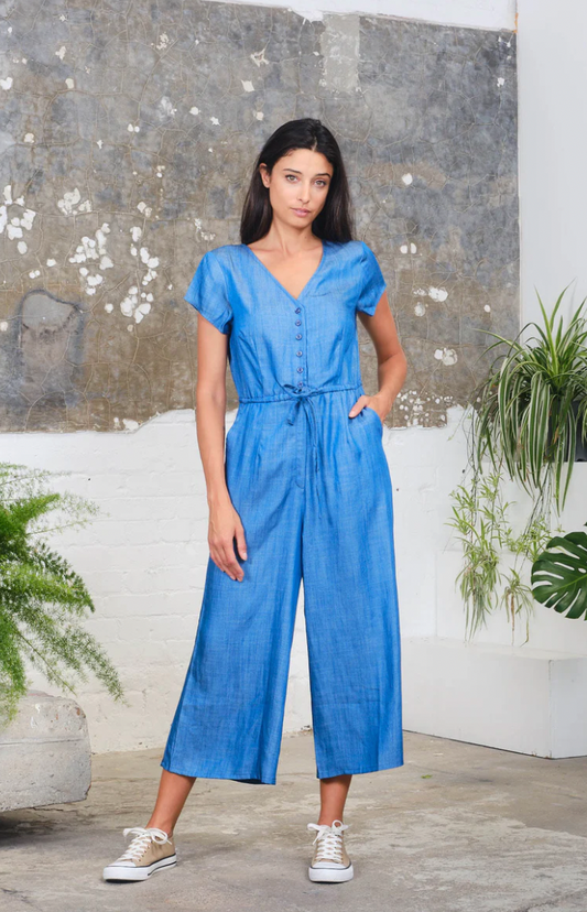 Pretty Vacant short sleeved playsuit in chambray blue