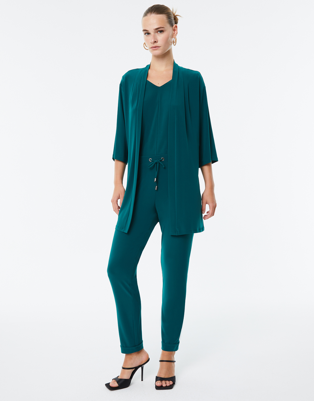 Paz Torras green jacket waterfall neckline