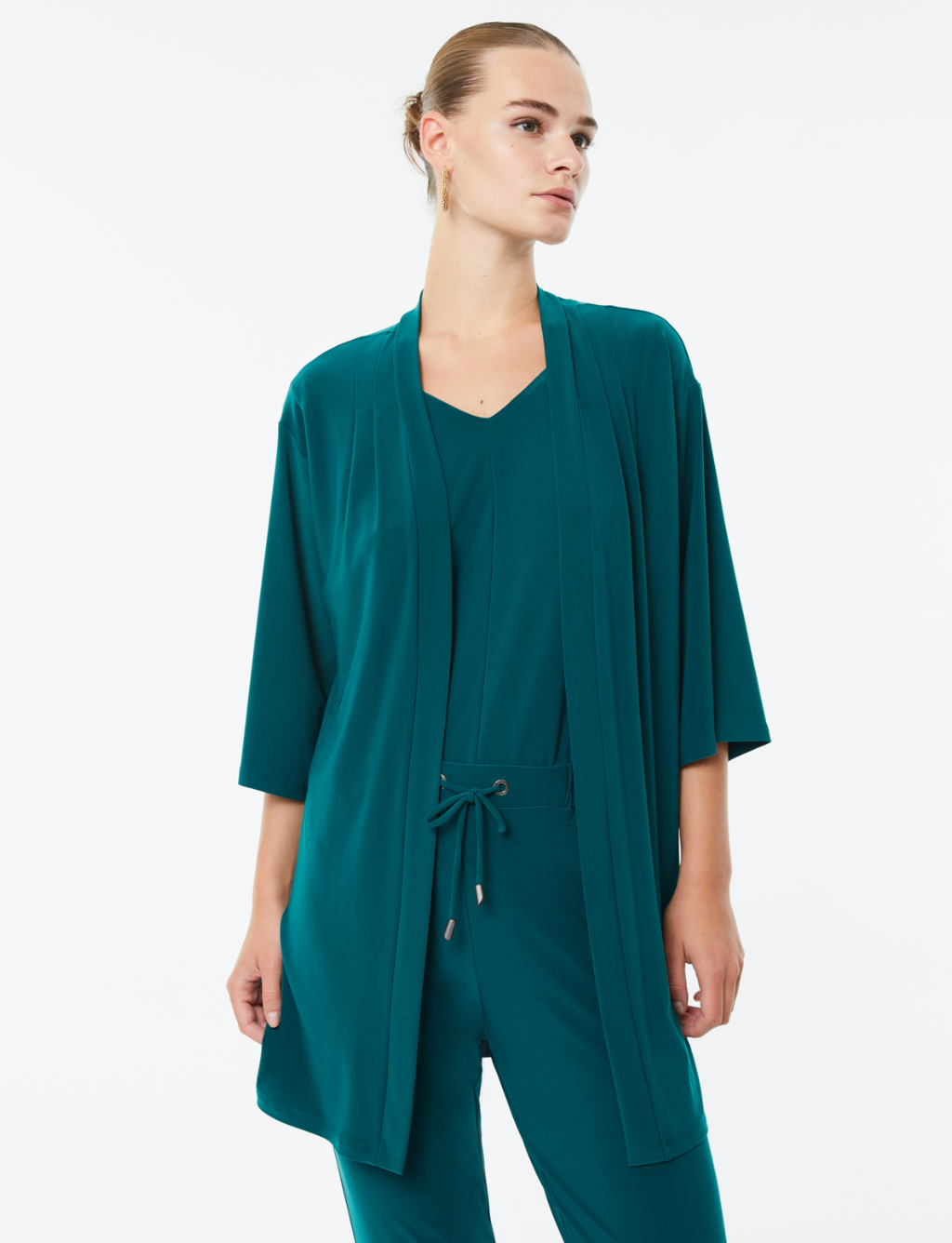 Paz Torras green jacket waterfall neckline