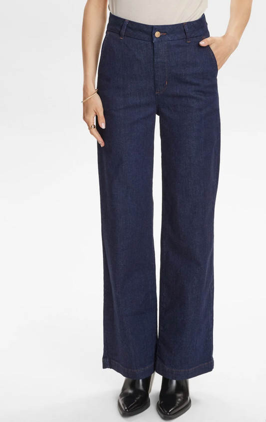 Dark blue straight leg jeans on a white background
