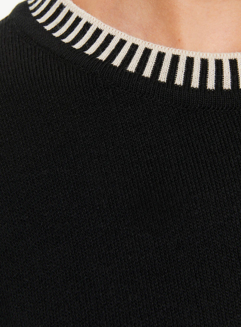 Paz Torras black sweater with contrast stitching
