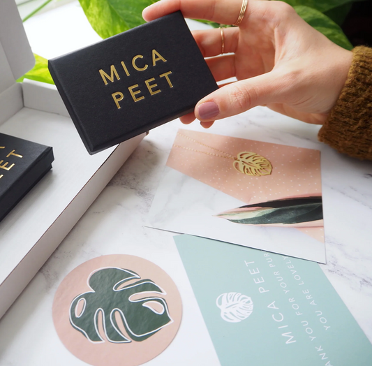 Mica Peet tropical monstera earrings